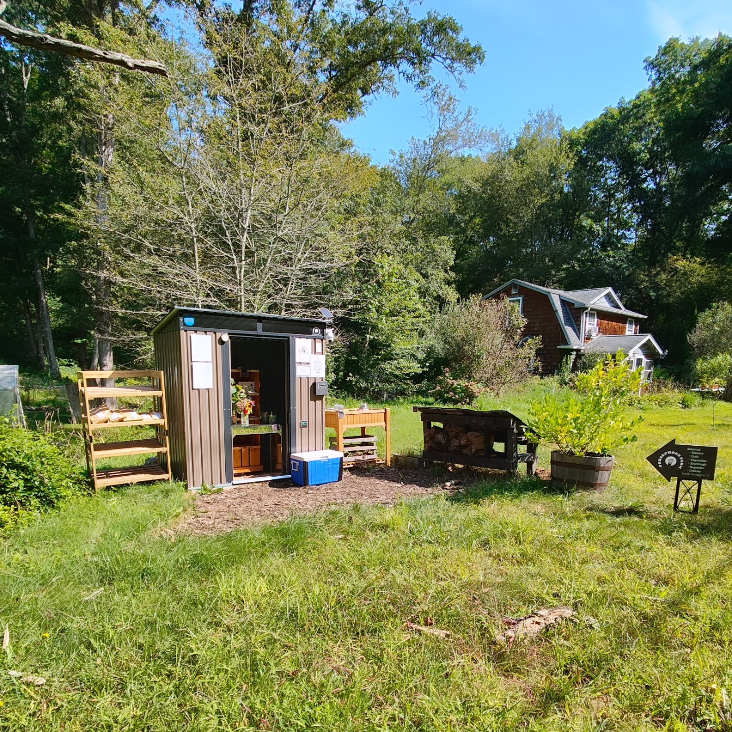 Farm stand with fresh produce and flowers